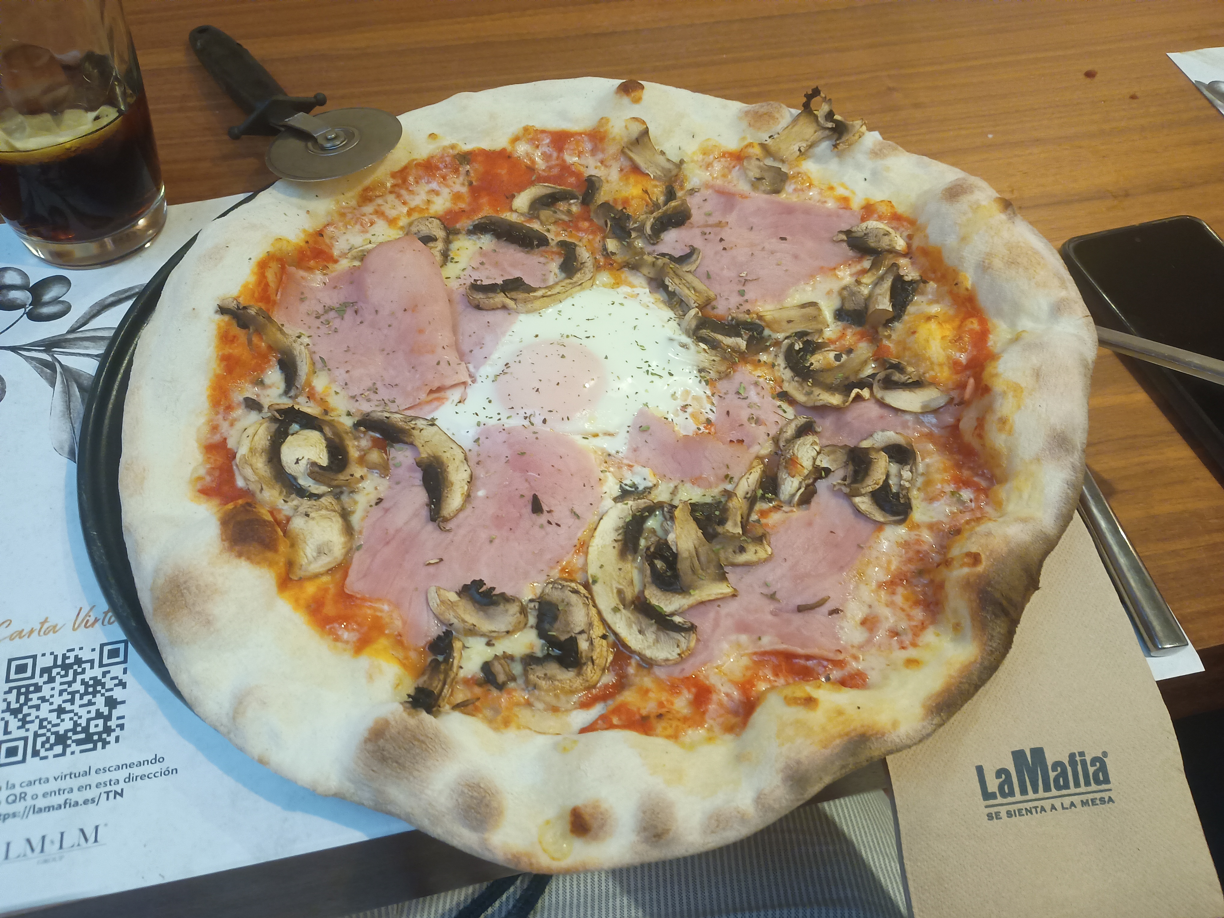 Mushroom and ham pizza and an egg